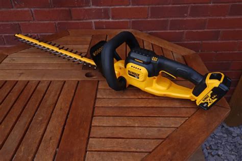 DeWalt 20V vs 60V Trimmer: Which One? - HookedOnTool