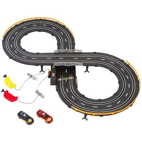 a toy car race track set with cars on the tracks and an electric charger