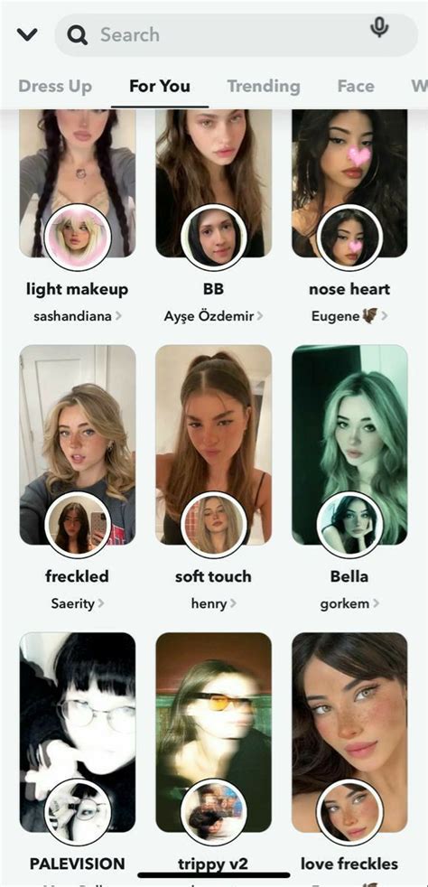 an iphone screen with many different faces and words on the phone's buttons,