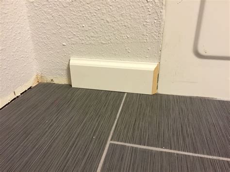 trim - How can I transition from baseboard to a flat bathtub? - Home Improvement Stack Exchange