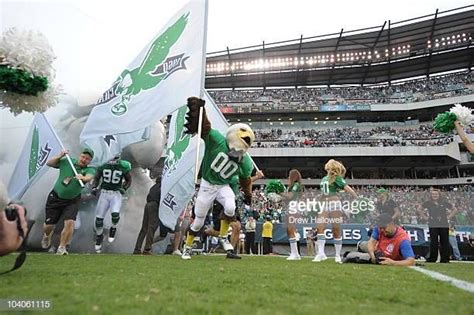 Philadelphia Eagles mascot Swoop leads the team onto the field during ...