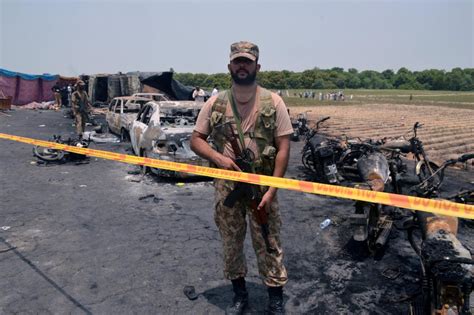 Overturned oil tanker in Pakistan bursts into flames, killing 148 ...