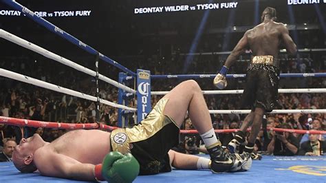 Tyson Fury gets up after 12th round Deontay Wilder knockdown video ...