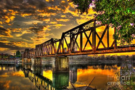 Sunset At Augusta's 6th Street Trestle Bridge Over The Savannah River Photograph by Reid Callaway