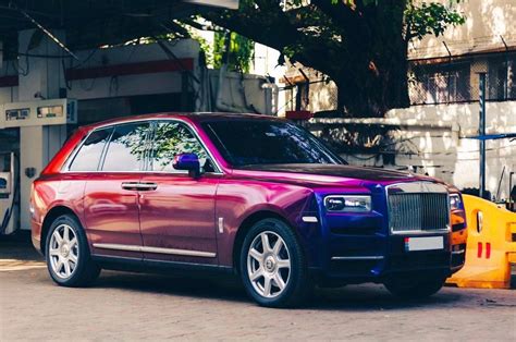 While his daughter moves around in a color-changing Rolls Royce SUV ...