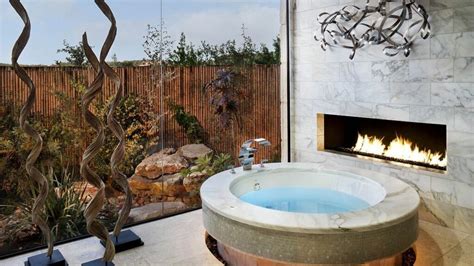 Bathroom Fireplace Trend Taking the Design World by Storm