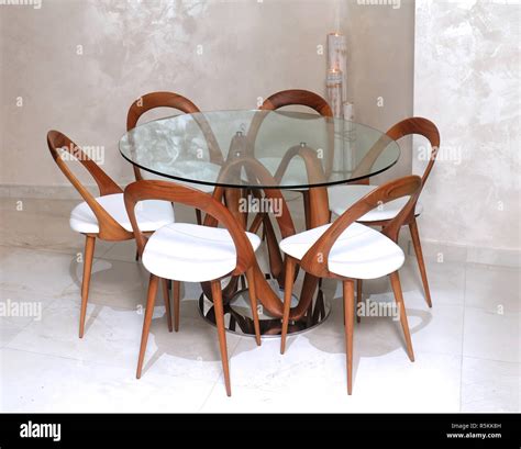 Glass dining table Stock Photo - Alamy