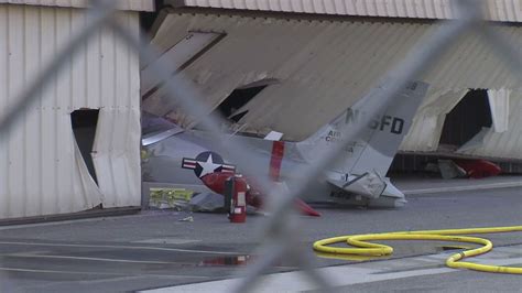 Private aircraft crashes into Fullerton airport hangar moments after takeoff - ABC7 Los Angeles