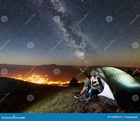 Couple Tourists Resting at Night Camping Under Stars Stock Photo ...