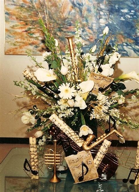 Music and flower centerpiece | Music themed wedding, Music centerpieces, Music themed parties