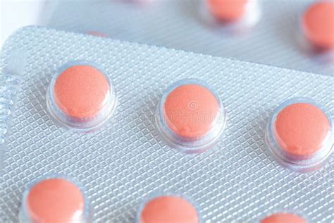 Orange-pink Round Pills in Packaging Close-up, Medicines , Top View ...