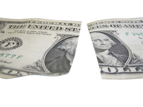 Dollar Bill | A dollar bill cut in half, isolated on a white… | Flickr