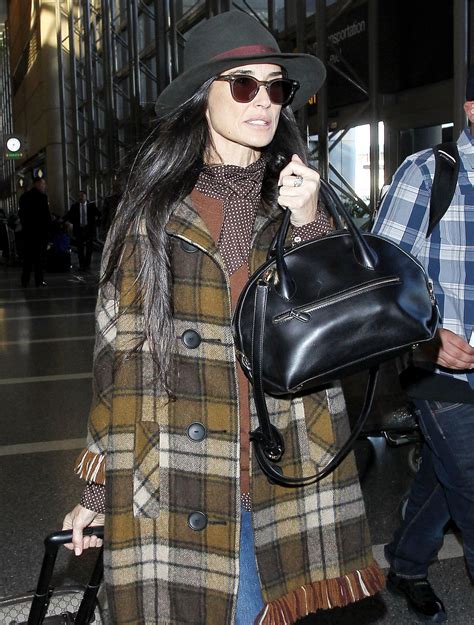 Demi Moore Airport Style - at LAX, December 2015 • CelebMafia