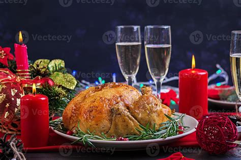 Baked turkey. Christmas dinner. The Christmas table is served with a turkey, decorated with ...