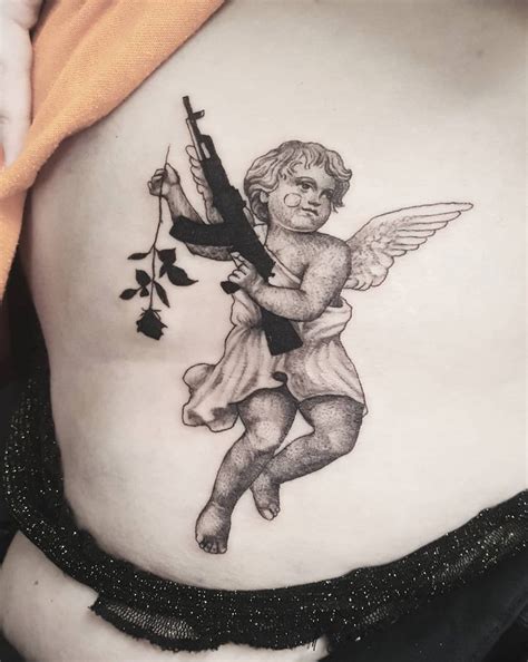 Caring For A New Tattoo | Tattoos, Cupid tattoo