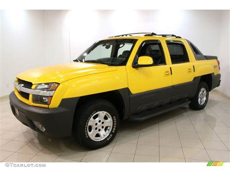 Yellow 2003 Chevrolet Avalanche 1500 Z71 4x4 Exterior Photo #74805944 | GTCarLot.com