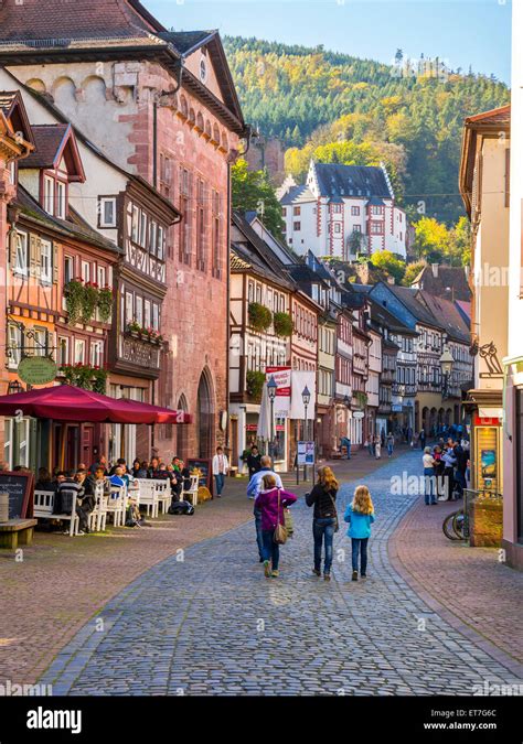 Germany, Miltenberg, view to alley of historic old town with Mildenburg in the background Stock ...