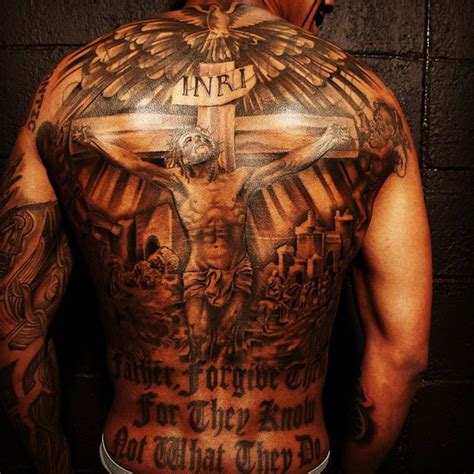 Check Out Nick Cannon’s Tattoo on His Back and His Other Skin Art