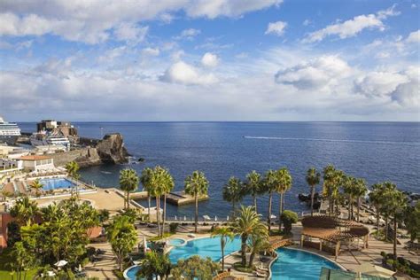 an aerial view of a resort and pool area