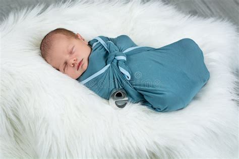 Newborn baby boy sleeping stock photo. Image of laying - 98609166