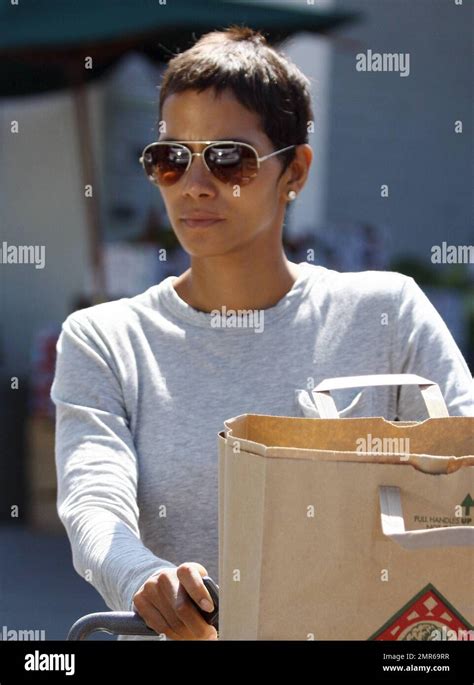 Actress Halle Berry pays a visit to a local market to pick up some ...