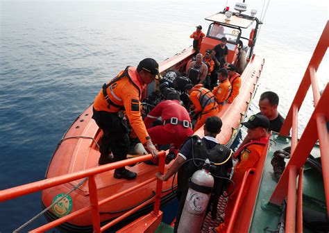 Lion Air plane crash: Passengers' bodies found still strapped in seats on seafloor, official ...