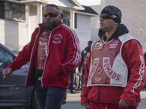 Nomads motorcycle club members Philippe Boudreau (left) and Martin Bernatchez leave the Alfred ...