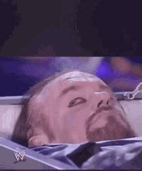 The Undertaker Lying On Coffin GIF | GIFDB.com