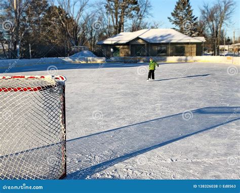 Outdoor Ice Hockey Rink in Late Afternoon with Long Shadows Stock Photo ...