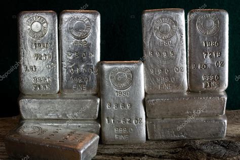 Stacked Silver Bullion Bars — Stock Photo © Fireflyphoto #31660459