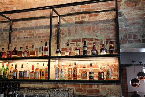 Hotel Bar Wall Shelving in Black Steel