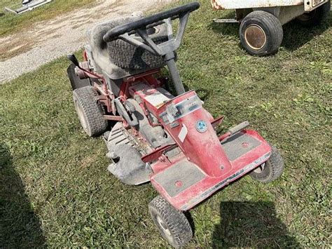 Snapper SR 1328 riding lawn mower with broken - Legacy Auction Company