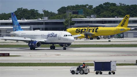 DOJ sues to block JetBlue from buying Spirit Airlines : NPR