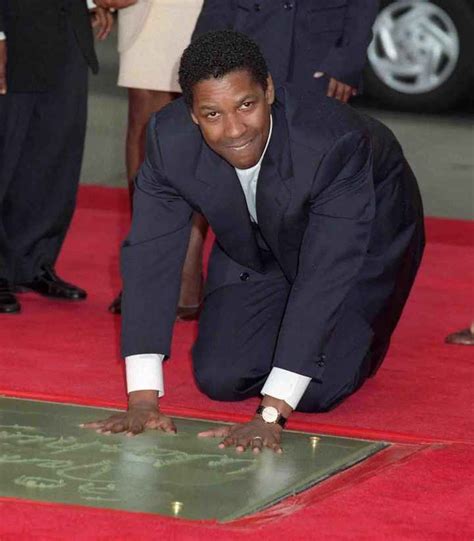 Denzel Washington at his hand and footprint ceremony at Grauman's ...