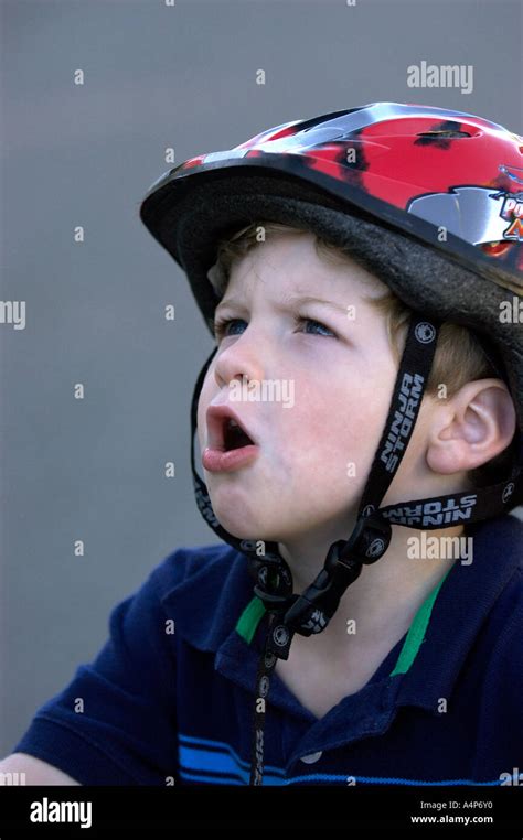 boy with bike helmet Stock Photo - Alamy