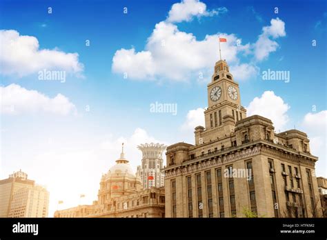 Old Customs Building with Clock and Flag, The Bund, Shanghai, China. The Customs Building was ...
