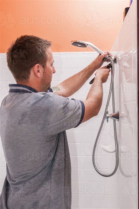 Plumber installing a shower head and tap | Shower heads, Plumber, Installation