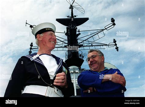 Left-right: HMS Cavalier tour guide Archie McLaughlin and volunteer Ken Waddington in front of ...