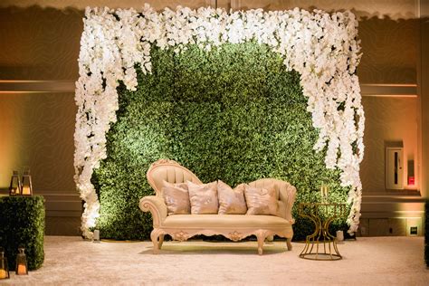 Unique floral wedding backdrop with beautiful lounge furniture | Luxury ...