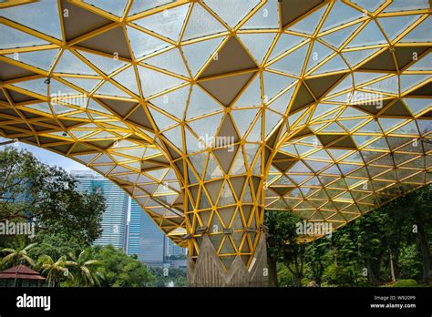 The Perdana Canopy, a unique structure of modern geometric design. blends into nature in the ...