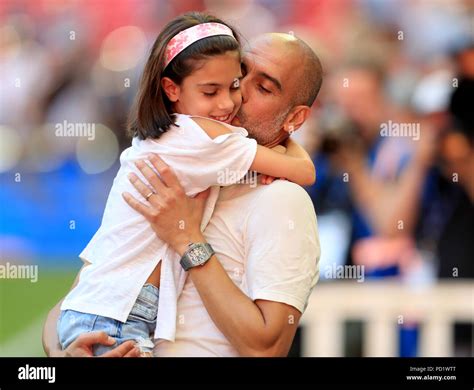 Manchester City manager Josep Guardiola celebrates with his daughter Valentina Guardiola after ...