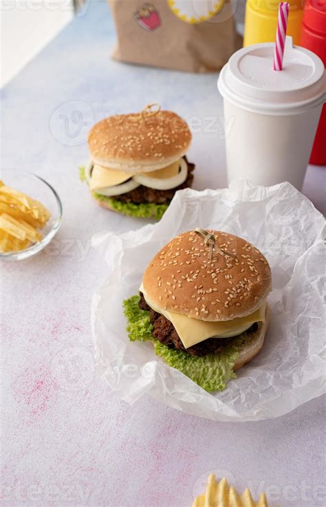 Set of homemade burgers, chips and drink 3733678 Stock Photo at Vecteezy