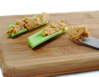 20 Delicious Low-Sugar Snacks: Peanut Butter with Celery Sticks