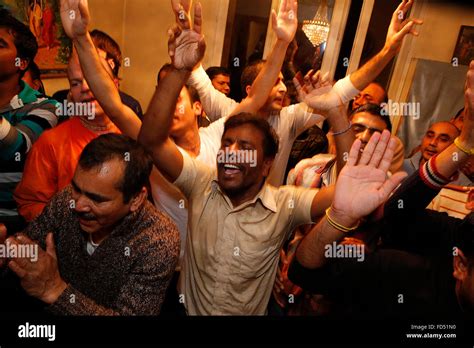 Devotees dancing in an ISKCON temple Stock Photo - Alamy