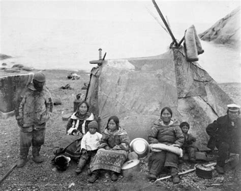 A group of Inuit in front of a tupik at Eywack Station, Mi… | Flickr