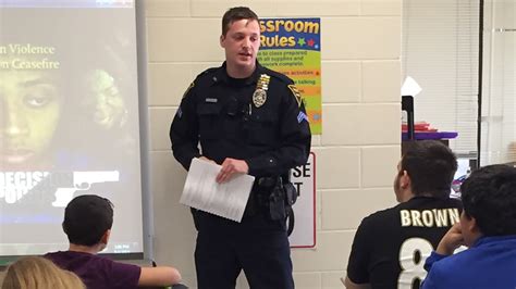 Fayetteville police officers teach gun violence awareness to 7th ...