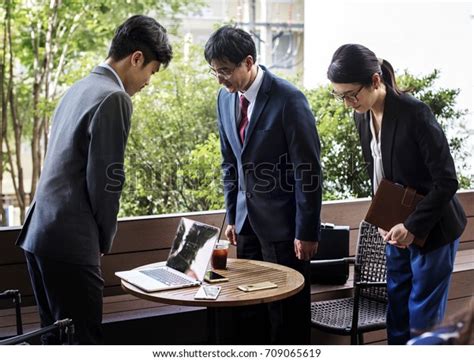 Business People Greeting Bowing Gesture Stock Photo (Edit Now) 709065619