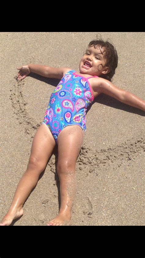 Making Sand Angels At The Beach - Vero's Beachiest Kid Photo Contest