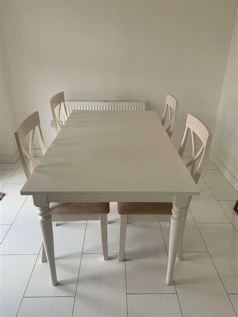 Ikea white extendable dining table with 4 chairs | in Glasgow | Gumtree