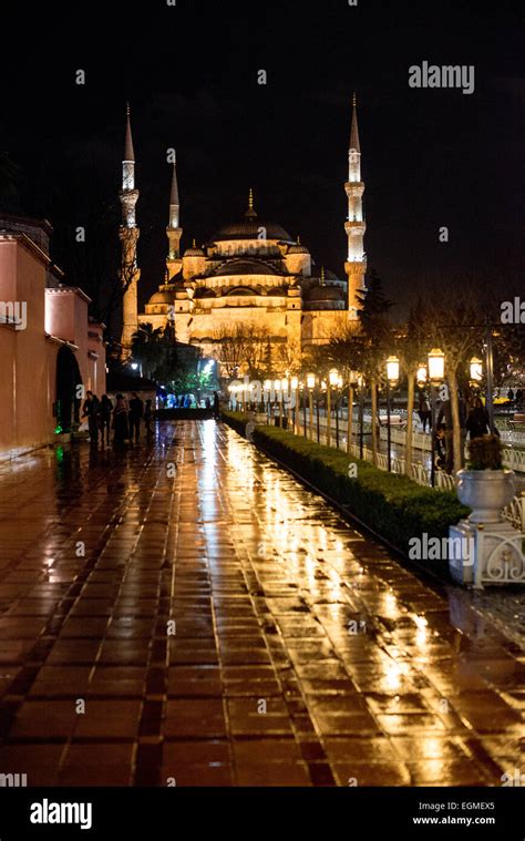 A view of the Blue Mosque at night from Sultanahmet Square. While it is ...